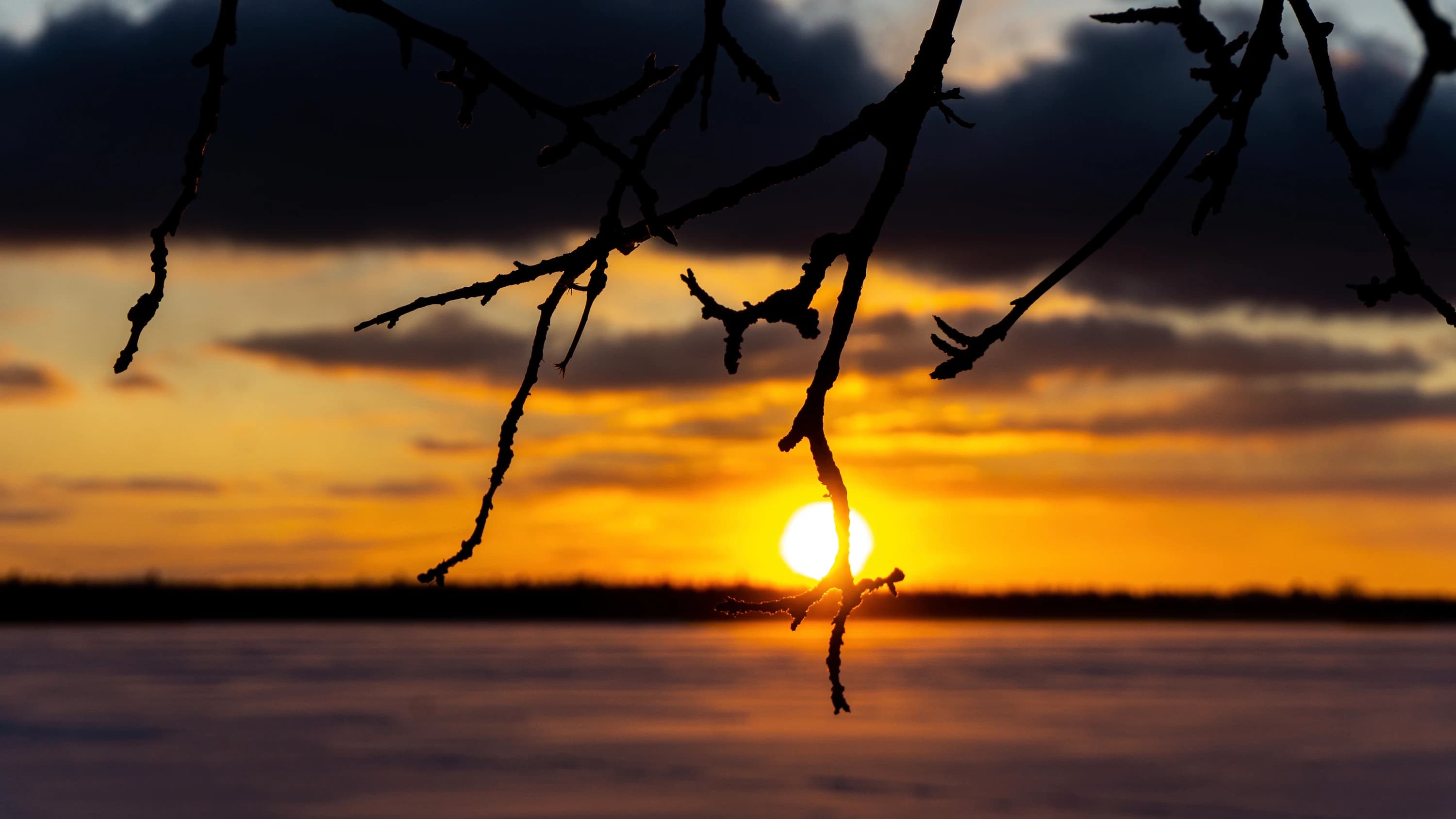 The sun setting over Grand Lake.
